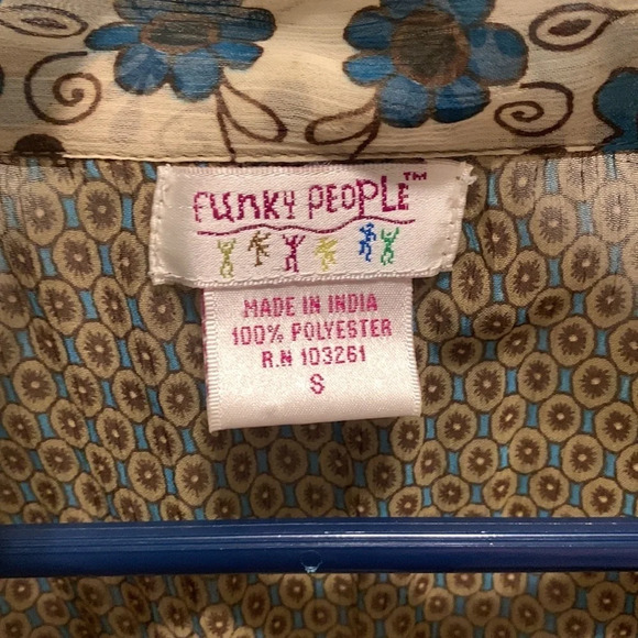 Definitely boho vibes.  Sheer long-sleeved top w/ elastic waist and tie at neck. - Picture 5 of 6